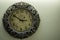 Ancient Designer Wall Clock With Light Yellow Back Ground showing time 02.50 o`clock and free spac on right side