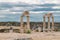 The ancient destroyed city of Hierapolis near Pamukkale, Denizli, Turkey in the summer. On a background the sky in overcast. Horiz