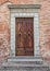 Ancient door of Episcopal palace of San Miniato.