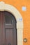 Ancient door in an Italian town close-up