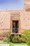 Ancient door on a restored entrance Arabian landmark in Marrakesh