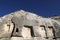 Ancient dovecote hollowed out in volcanic rock formations around the village of Goreme