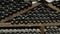 Ancient dusty wine bottles in an old cellar close-up