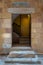 Ancient external old decorated bricks stone wall and doorway, Cairo, Egypt