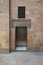 Ancient external old decorated bricks stone wall and opened door, Cairo, Egypt