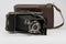 Ancient Folding Camera with Bellows and Brown Leather Case
