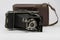 Ancient Folding Camera with Bellows and Brown Leather Case