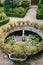 An ancient fountain in the centre of the courtyard of a winery in Italy, Tuscany.