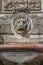 Ancient fountain with a lion head and cold clean water, Magdeburg, Germany