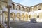 Ancient Franciscan cloister with columns and capitals in Corinth