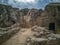 Ancient funerary caves hollowed out in a natural rock.