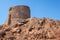 Ancient Genoese tower on Capo Rosso, Piana