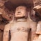 Ancient giant Jain Shri Adinatha statue carved out of rock near Gwalior fort, Madhya Pradesh, India