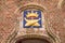 Ancient gilded sign over shop entrance in Bruges, Belgium