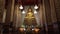 Ancient golden Buddha statue inside the temple of Wat Arun