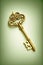 ancient golden key on a bright background, ai midjourney generated illustration