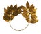Ancient golden laurel wreath at the head