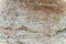 Ancient Greek antique text and inscriptions on the stone wall of the temple. Ancient Greek culture, alphabet and writing