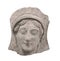 Ancient Greek bas-relief face isolated