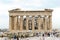 Ancient Greek ruins, columns, building. Tourists on excursions to the Acropolis, Athens, Greece