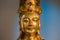 Ancient guanyin bronze statue face detail