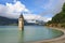 Ancient half-submerged bell tower in Graun im Vinschgau