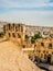 Ancient Herodes Atticus amphitheater with the cityscape on the background