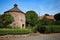 The ancient, historic round brick dovecote at Dunster, Somerset, UK