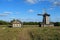 The ancient house from a felling and a windmill in the Lermontovsky memorial estate `Tarkhany` of the Penza region.