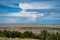 Ancient Hunters Overlook in Badlands National Park, as. a summer thunderstorm begins to roll through