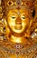 Ancient image of buddha with gold background