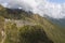 Ancient Inca ruin of Sayaqmarka watching over an andes valley
