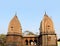 Ancient Indian temple domes joined by a passage bridge