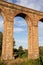 Ancient Italian Aqueduct in Evening Light