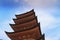 Ancient Japanese wood pagoda with blue sky