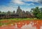 Ancient Khmer architecture. Ta Prohm temple with giant banyan tree at sunset. Angkor Wat complex, Siem Reap, Cambodia travel desti