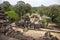 Ancient khmer temple view in Angkor Wat complex, Cambodia. Phnom Bakheng panorama with jungle forest.