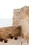 Ancient Larnaca castle walls and cannons in the courtyard, Cyprus