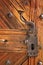 Ancient latch on beautiful wooden door