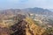 Ancient long wall with towers around Amber Fort, view from Jaigarh Fort. Rajasthan. India