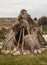 Ancient man hut. Teepee or wigwam tent house, outdoors