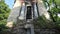 Ancient marble crypt with broken door at cemetery