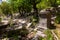 Ancient marble statue pedestal among ruins Agora of abandoned city Termessos