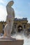 Ancient marble woman statue in thermal baths SzÃ©chenyi, Budapest, Hungary. Medieval art . Woman sculpture back view.