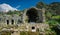 Ancient Mausoleum detail from Euromos Ancient City Ruins. Milas, Aydin, Turkey. South Necropolis. Old ruined arches.