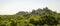 Ancient Maya ruins of Calakmul in the thick jungle and tree landscapes on a sunny day in the YucatÃ¡n Peninsula of Mexico.