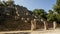 Ancient Maya ruins of Calakmul in the thick jungle and tree landscapes on a sunny day in the YucatÃ¡n Peninsula of Mexico.