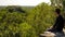 Ancient Maya ruins of Calakmul in the thick jungle and tree landscapes on a sunny day in the YucatÃ¡n Peninsula of Mexico.