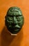 Ancient mayan jade mask with great eyes