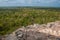 Ancient Mayan pyramids in the jungle Coba. Sun rays and scattered light. Yucatan, Mexico.